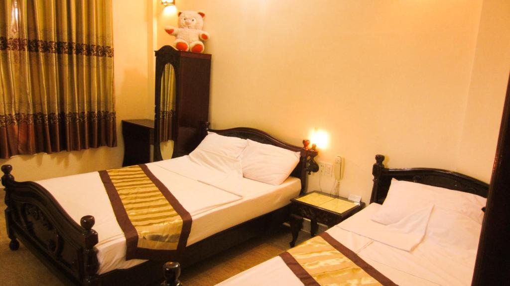 Hotel Binh Minh Sunrise Hué Chambre photo